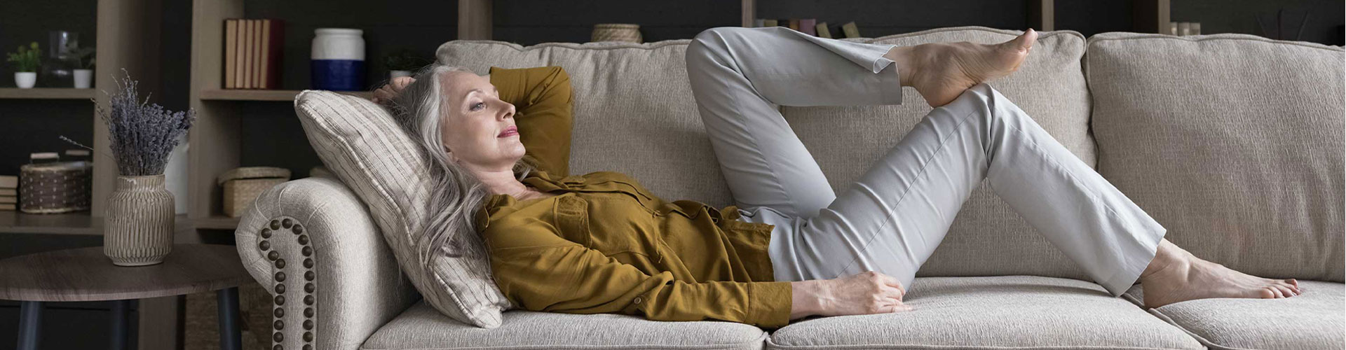 woman laying on a couch
